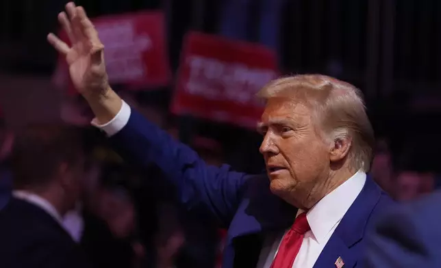 Republican presidential nominee former President Donald Trump waves at a campaign rally at Madison Square Garden, Sunday, Oct. 27, 2024, in New York. (AP Photo/Alex Brandon)