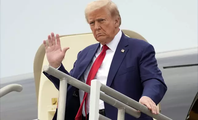 Republican presidential nominee former President Donald Trump arrives at Augusta Regional Airport to visit areas impacted by Hurricane Helene, Friday, Oct. 4, 2024, in Augusta, Ga. (AP Photo/Evan Vucci)