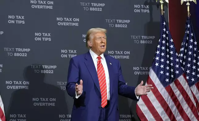 Republican presidential nominee former President Donald Trump arrives at a campaign event at the Cobb Energy Performing Arts Centre, Tuesday, Oct. 15, 2024, in Atlanta. (AP Photo/Alex Brandon)