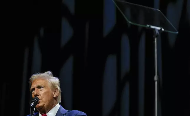 Republican presidential nominee former President Donald Trump speaks at a meeting of the Detroit Economic Club, Thursday, Oct. 10, 2024, in Detroit. (AP Photo/Julia Demaree Nikhinson)