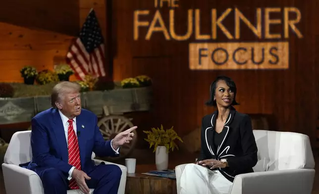 Republican presidential nominee former President Donald Trump speaks during a break in a Fox News town hall with Harris Faulkner at The Reid Barn, Tuesday, Oct. 15, 2024, in Cumming, Ga. (AP Photo/Julia Demaree Nikhinson)