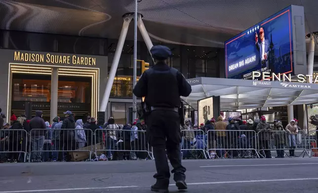 Supporters of Republican presidential nominee former President Donald Trump gather for his campaign rally outside Madison Square Garden, Sunday, Oct. 27, 2024, in New York. (AP Photo/Yuki Iwamura)