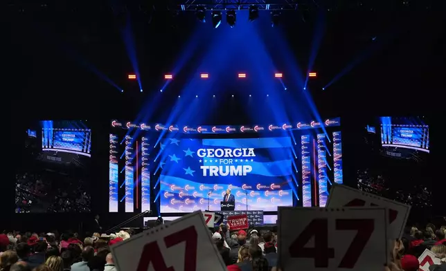 Republican presidential nominee former President Donald Trump speaks at a Turning Point Action campaign rally, Wednesday, Oct. 23, 2024, in Duluth, Ga. (AP Photo/Alex Brandon)