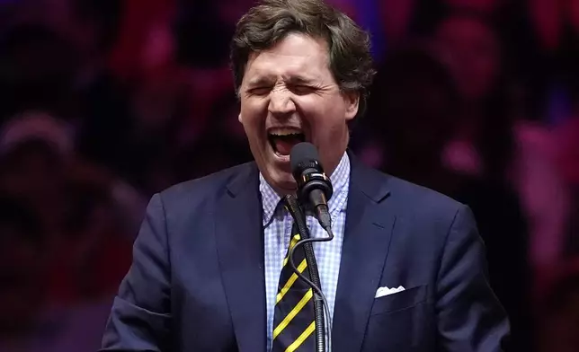 Tucker Carlson speaks before Republican presidential nominee former President Donald Trump at a campaign rally at Madison Square Garden, Sunday, Oct. 27, 2024, in New York. (AP Photo/Evan Vucci)