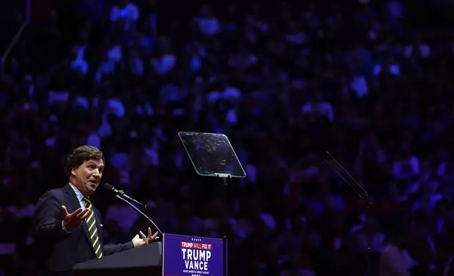 Tucker Carlson speaks at a campaign rally for Republican presidential nominee former President Donald Trump at Madison Square Garden, Sunday, Oct. 27, 2024, in New York. (AP Photo/Julia Demaree Nikhinson)