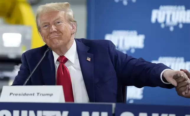 Republican presidential nominee former President Donald Trump arrives at a campaign roundtable, Friday, Oct. 18, 2024, in Auburn Hills, Mich. (AP Photo/Evan Vucci)