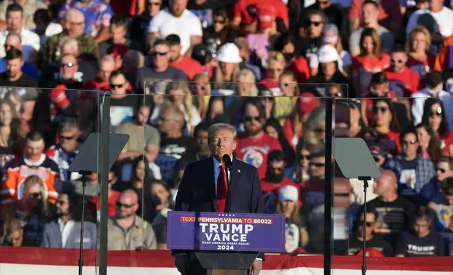 Republican presidential nominee former President Donald Trump pauses for a moment of silence at a campaign rally at the Butler Farm Show, Saturday, Oct. 5, 2024, in Butler, Pa. (AP Photo/Julia Demaree Nikhinson)