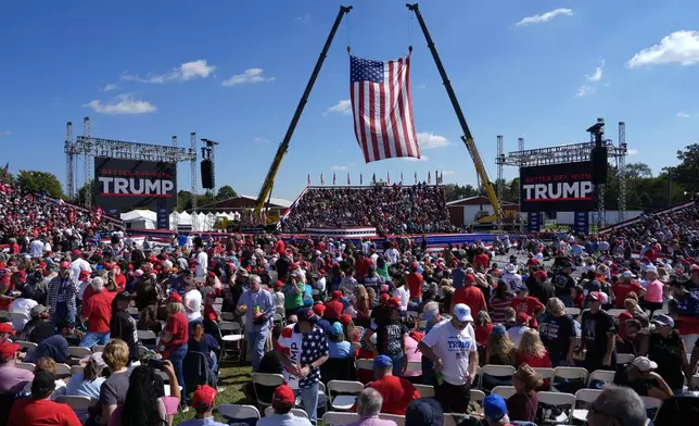 Supporters arrive before Republican presidential nominee former President Donald Trump speaks at a campaign rally at the Butler Farm Show, Saturday, Oct. 5, 2024, in Butler, Pa. (AP Photo/Julia Demaree Nikhinson)