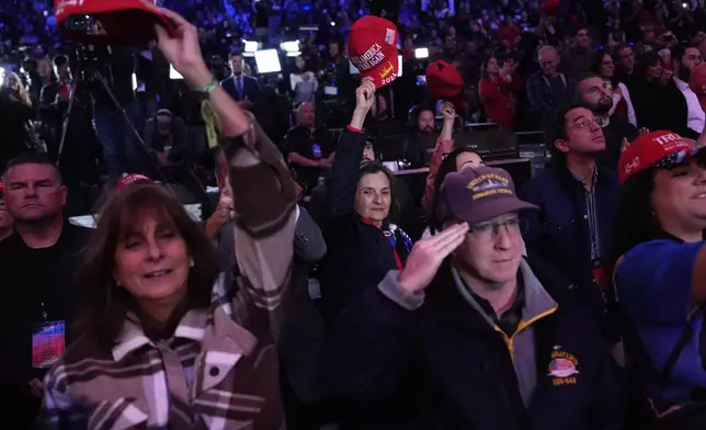 Attendees cheer at a campaign rally for Republican presidential nominee former President Donald Trump at Madison Square Garden, Sunday, Oct. 27, 2024, in New York. (AP Photo/Julia Demaree Nikhinson)