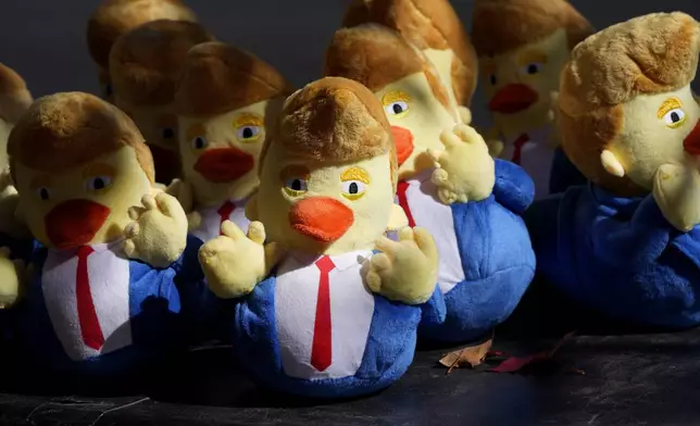 Donald Trump-themed stuffed toy ducks are pictured before the Republican presidential nominee former President arrives at the Lancaster Convention Center in Lancaster, Pa., Sunday, Oct. 20, 2024, where Trump will hold a town hall. (AP Photo/Susan Walsh)