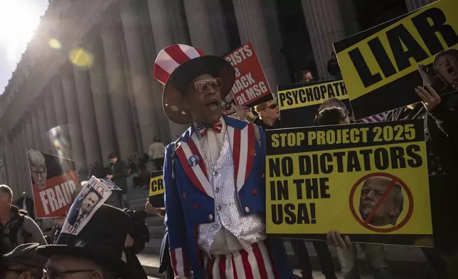 Counter protesters chant during a campaign rally by Republican presidential nominee former President Donald Trump at Madison Square Garden, Sunday, Oct. 27, 2024, in New York. (AP Photo/Yuki Iwamura)