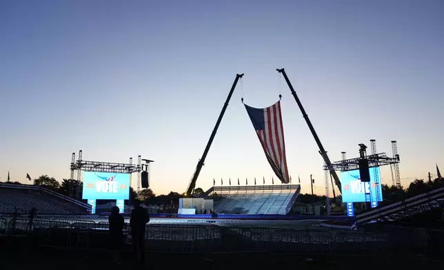 The campaign rally site is seen near sunrise before Republican presidential nominee former President Donald Trump speaks at the Butler Farm Show, the site where a gunman tried to assassinate him in July, Saturday, Oct. 5, 2024, in Butler, Pa. (AP Photo/Alex Brandon)