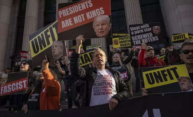 Counter protesters chant during a campaign rally by Republican presidential nominee former President Donald Trump at Madison Square Garden, Sunday, Oct. 27, 2024, in New York. (AP Photo/Yuki Iwamura)