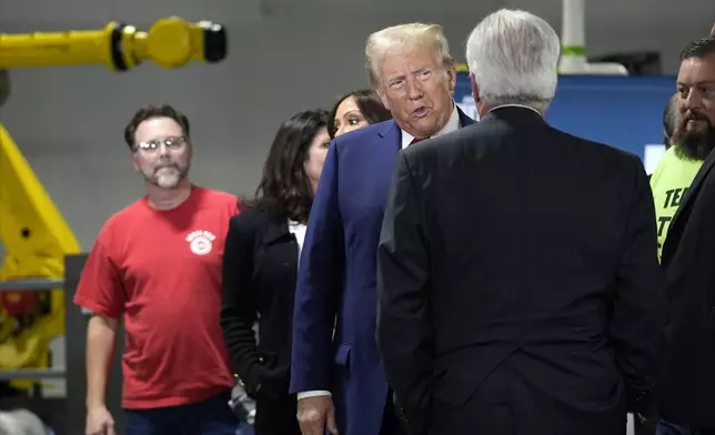 Republican presidential nominee former President Donald Trump speaks at a campaign roundtable, Friday, Oct. 18, 2024, in Auburn Hills, Mich. (AP Photo/Evan Vucci)