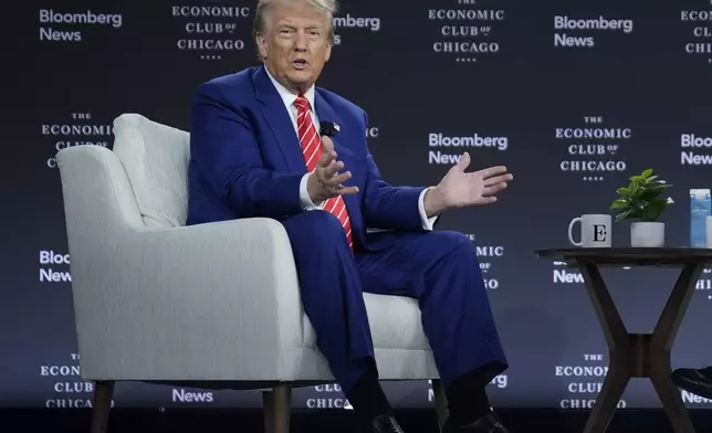 Republican presidential nominee former President Donald Trump speaks during an interview with Bloomberg News Editor-in-Chief John Micklethwait during an event with the Economic Club of Chicago, Tuesday, Oct. 15, 2024, in Chicago. (AP Photo/Evan Vucci)