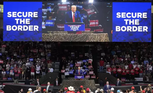 Republican presidential nominee former President Donald Trump speaks at a campaign rally at the Findlay Toyota Arena Sunday, Oct. 13, 2024, in Prescott Valley, Ariz. (AP Photo/Ross Franklin)