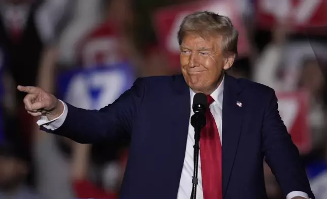 Republican presidential nominee former President Donald Trump speaks at a campaign rally at McCamish Pavilion Monday, Oct. 28, 2024, in Atlanta. (AP Photo/Mike Stewart)