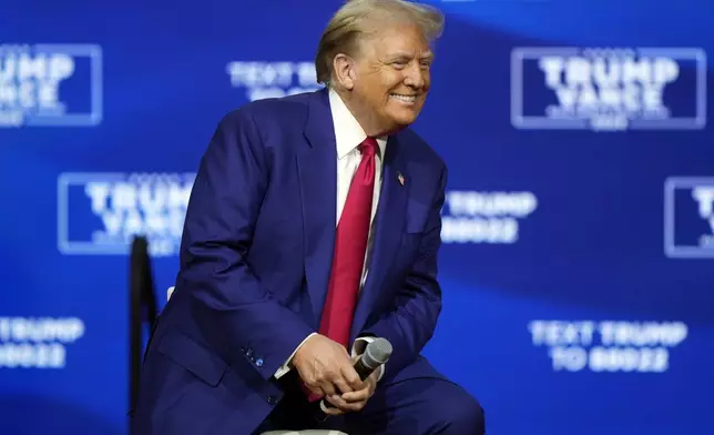 Republican presidential nominee former President Donald Trump listens at a campaign town hall at the Greater Philadelphia Expo Center &amp; Fairgrounds, Monday, Oct. 14, 2024, in Oaks, Pa. (AP Photo/Matt Rourke)