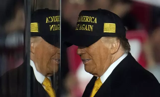 Republican presidential nominee former President Donald Trump on stage at a campaign event Friday, Oct. 25, 2024, in Traverse City, Mich. (AP Photo/Paul Sancya)