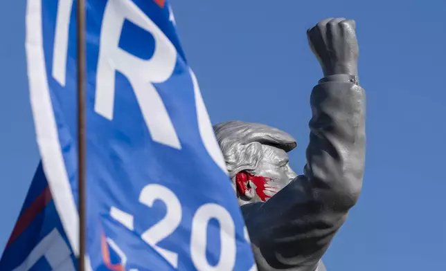 A statue of Republican presidential nominee former President Donald Trump is set up on a truck ahead of a campaign event at the Butler Farm Show, Friday, Oct. 4, 2024, in Butler, Pa. (AP Photo/Alex Brandon)