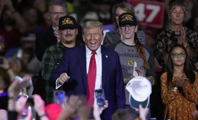 Republican presidential nominee former President Donald Trump arrives at a town hall in Lancaster, Pa., Sunday, Oct. 20, 2024. (AP Photo/Susan Walsh)