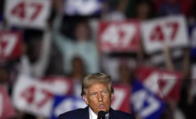 Republican presidential nominee former President Donald Trump speaks at a campaign rally at McCamish Pavilion Monday, Oct. 28, 2024, in Atlanta. (AP Photo/Mike Stewart)