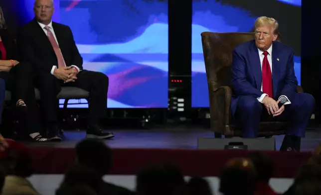 Republican presidential nominee former President Donald Trump listens during a faith town hall with Georgia Lt. Gov. Burt Jones at Christ Chapel Zebulon, Wednesday, Oct. 23, 2024, in Zebulon, Ga. (AP Photo/Julia Demaree Nikhinson)