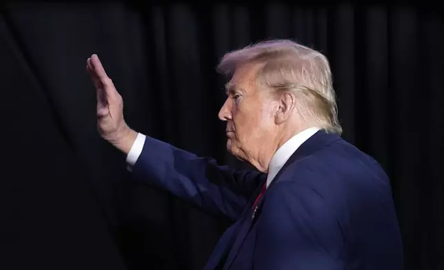 Republican presidential nominee former President Donald Trump waves at a campaign rally at Greensboro Coliseum, Tuesday, Oct. 22, 2024, in Greensboro, N.C. (AP Photo/Alex Brandon)