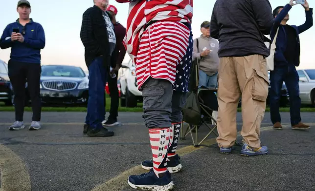 Supporters of Republican presidential nominee former President Donald Trump wait to enter a campaign rally at the Butler Farm Show, Saturday, Oct. 5, 2024, in Butler, Pa. (AP Photo/Julia Demaree Nikhinson)