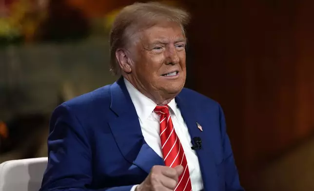 Republican presidential nominee former President Donald Trump speaks during a break in a Fox News town hall with Harris Faulkner at The Reid Barn, Tuesday, Oct. 15, 2024, in Cumming, Ga. (AP Photo/Julia Demaree Nikhinson)