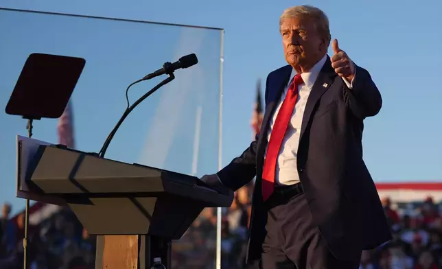 Republican presidential nominee former President Donald Trump gestures at a campaign rally at the Butler Farm Show, Saturday, Oct. 5, 2024, in Butler, Pa. (AP Photo/Evan Vucci)