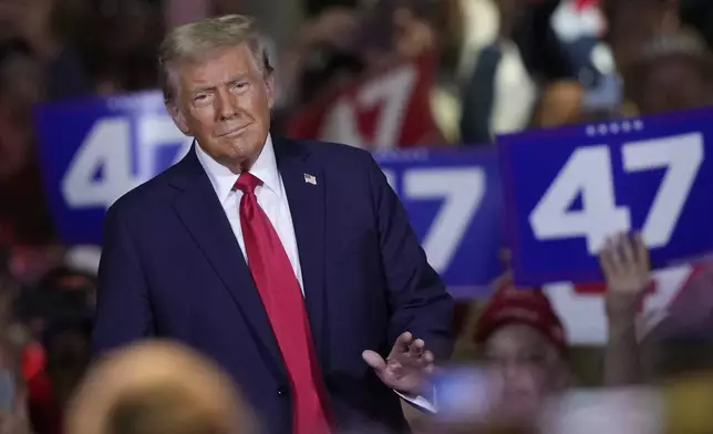 Republican presidential nominee former President Donald Trump arrives at a town hall in Lancaster, Pa., Sunday, Oct. 20, 2024. (AP Photo/Susan Walsh)