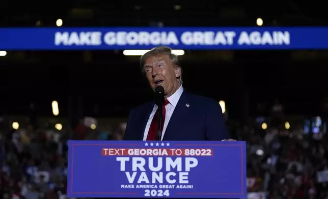 Republican presidential nominee former President Donald Trump speaks at a campaign rally at McCamish Pavilion Monday, Oct. 28, 2024, in Atlanta, Ga. (AP Photo/Julia Demaree Nikhinson)