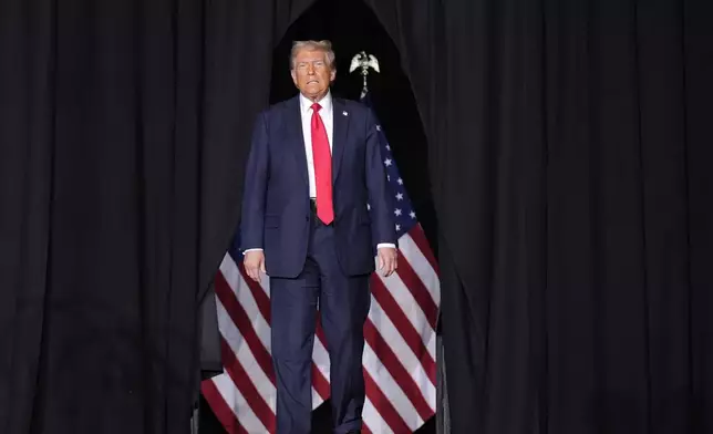 Republican presidential nominee former President Donald Trump arrives for a campaign rally at the Gaylord Rockies Resort &amp; Convention Center, Friday, Oct. 11, 2024, in Aurora, Colo. (AP Photo/Alex Brandon)