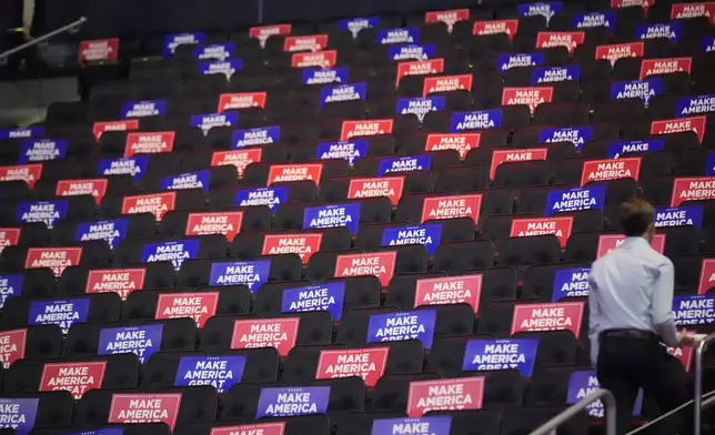 Signs are placed in seats before Republican presidential nominee former President Donald Trump speaks at a campaign rally at Madison Square Garden, Sunday, Oct. 27, 2024, in New York. (AP Photo/Alex Brandon)