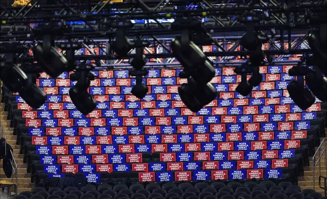 Signs in seats before Republican presidential nominee former President Donald Trump speaks at a campaign rally at Madison Square Garden, Sunday, Oct. 27, 2024, in New York. (AP Photo/Julia Demaree Nikhinson)