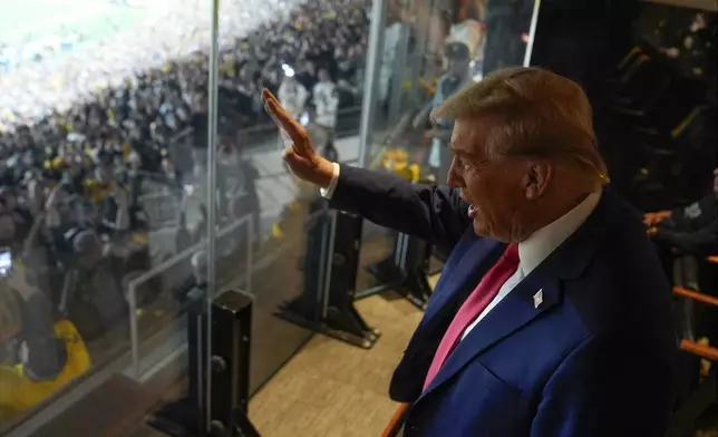 Republican presidential nominee former President Donald Trump attends the New York Jets football game against the Pittsburgh Steelers at Acrisure Stadium, Sunday, Oct. 20, 2024, in Pittsburgh. (AP Photo/Evan Vucci)