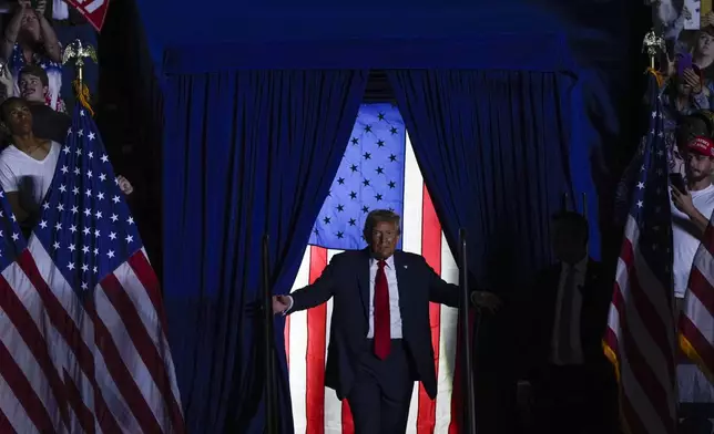 Republican presidential nominee former President Donald Trump arrives at a campaign rally at McCamish Pavilion Monday, Oct. 28, 2024, in Atlanta, Ga. (AP Photo/Julia Demaree Nikhinson)