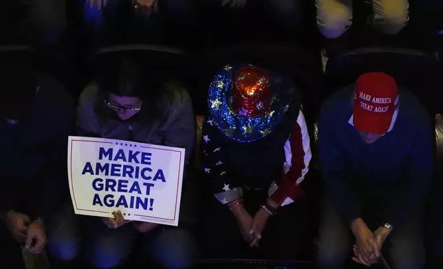 Attendees wait for Republican presidential nominee former President Donald Trump at a campaign rally at Madison Square Garden, Sunday, Oct. 27, 2024, in New York. (AP Photo/Julia Demaree Nikhinson)