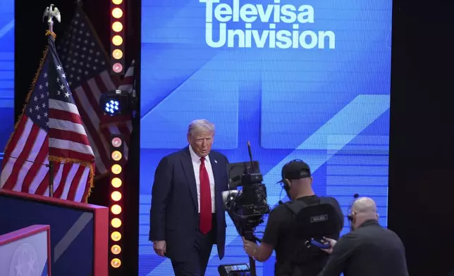 Republican presidential nominee former President Donald Trump arrives for a Univision town hall, Wednesday, Oct. 16, 2024, in Doral, Fla. (AP Photo/Alex Brandon)