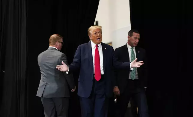 Republican presidential nominee former President Donald Trump arrives at a campaign event Saturday, Oct. 12, 2024, in North Las Vegas, Nev. (AP Photo/Lucas Peltier)