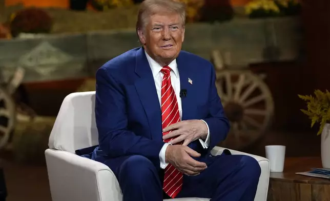 Republican presidential nominee former President Donald Trump listens during a break in a Fox News town hall with Harris Faulkner at The Reid Barn, Tuesday, Oct. 15, 2024, in Cumming, Ga. (AP Photo/Julia Demaree Nikhinson)