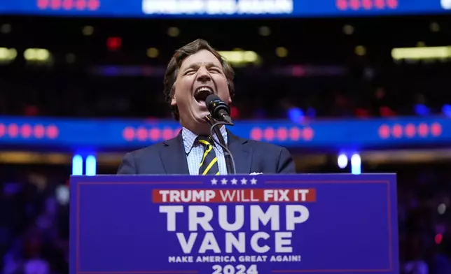 Tucker Carlson speaks before Republican presidential nominee former President Donald Trump at a campaign rally at Madison Square Garden, Sunday, Oct. 27, 2024, in New York. (AP Photo/Alex Brandon)