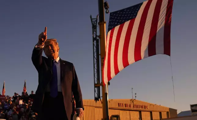 Republican presidential nominee former President Donald Trump arrives for a campaign rally at Arnold Palmer Regional Airport, Saturday, Oct. 19, 2024, in Latrobe, Pa. (AP Photo/Evan Vucci)