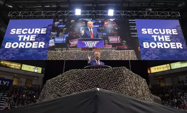 Republican presidential nominee former President Donald Trump speaks at a campaign rally at the Findlay Toyota Arena Sunday, Oct. 13, 2024, in Prescott Valley, Ariz. (AP Photo/Evan Vucci)