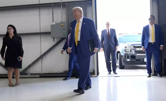 Republican presidential nominee former President Donald Trump arrives to speak at a news conference at Austin-Bergstrom International Airport, Friday, Oct. 25, 2024, in Austin, Texas. (AP Photo/Alex Brandon)