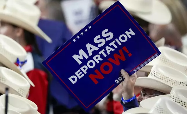 FILE - A member of the Texas delegation holds a sign during the Republican National Convention on July 17, 2024, in Milwaukee. (AP Photo/Matt Rourke, File)