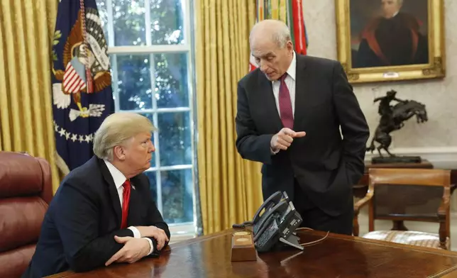 FILE - President Donald Trump listens to White House Chief of Staff John Kelly, right, in the Oval Office of the White House in Washington, Oct. 10, 2018. (AP Photo/Pablo Martinez Monsivais, File)