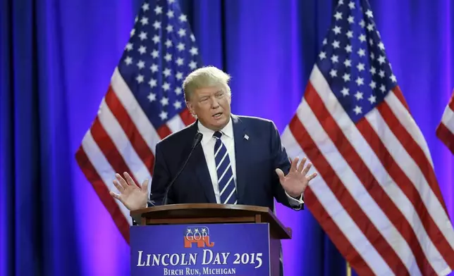 FILE - Republican presidential candidate Donald Trump addresses a GOP fundraising event, Aug 11, 2015, in Birch Run, Mich. (AP Photo/Carlos Osorio, File)