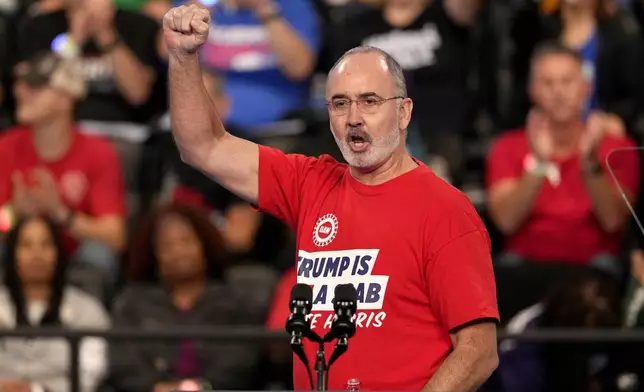 FILE - United Auto Workers President Shawn Fain speaks at a campaign rally for Democratic presidential nominee Vice President Kamala Harris at the Dort Financial Center in Flint, Mich., Oct. 4, 2024. (AP Photo/Carolyn Kaster, File)